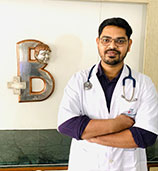 Dr. Baliram Gore